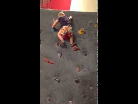 Toddler rock climbing without a harness