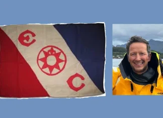 Стефан Иванов и знамето на The Explorers Club